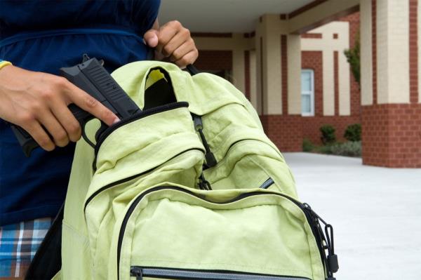 Backpack with gun