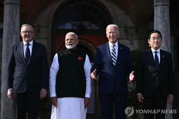 U.S. President Joe Biden (2nd from R), Australian Prime Minister Anthony Albanese (L), Indian Prime Minister Narendra Modi (2nd from L) and Japanese Prime Minister Fumio Kishida pose for a photo at the Archmere Academy in Wilmington, Delaware, on Sept. 21, 2024, as they gather for a Quad summit, in this photo released by AFP. (Yonhap)
